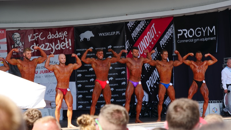Sopot body builders tanned up and flexing by the beach in Poland 