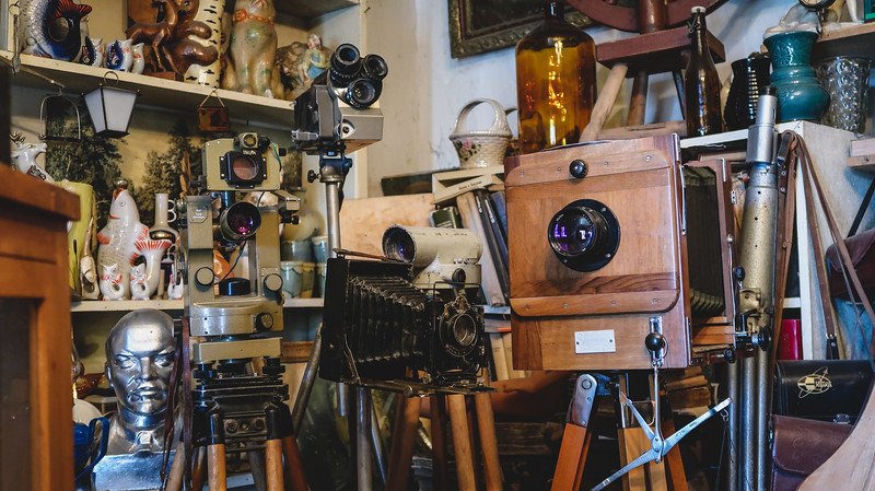 Soviet-era souvenirs at the Antique Shop of Aleksandr Korablev in Karakol  including unique and distinct vintage camera and gear in Kyrgyzstan