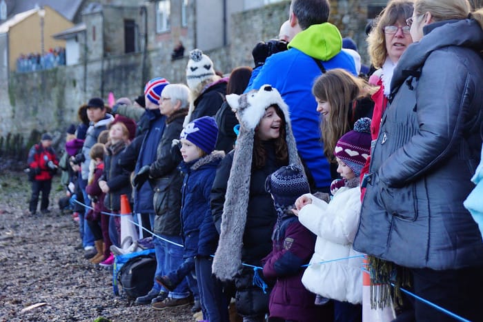 Spectators at the Loony Dook enjoying the event with nothing but big smiles in Scotland