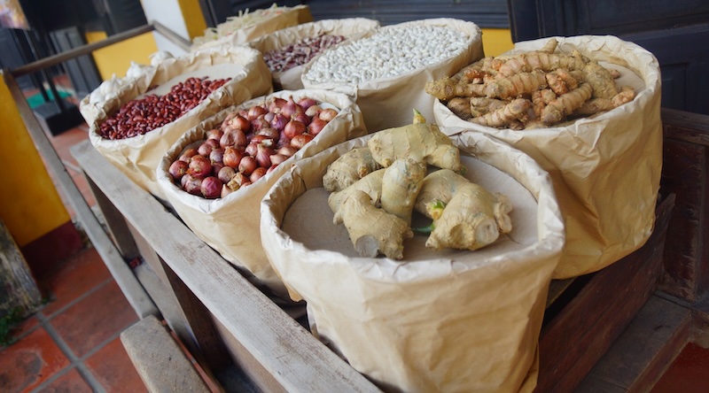 Spices and dried food items for sale at a local market in Vietnam 