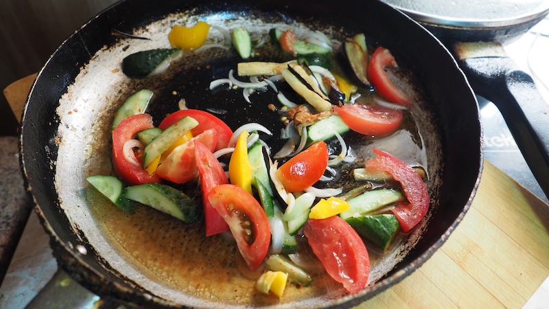 Stir frying vegetables in Karakol, Kyrgyzstan 