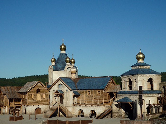Elaborate wooden and stone stage set with golden onion domes at the Störtebeker Festspiele in Ralswiek on Rügen Island, Germany, used for open-air theatrical performances