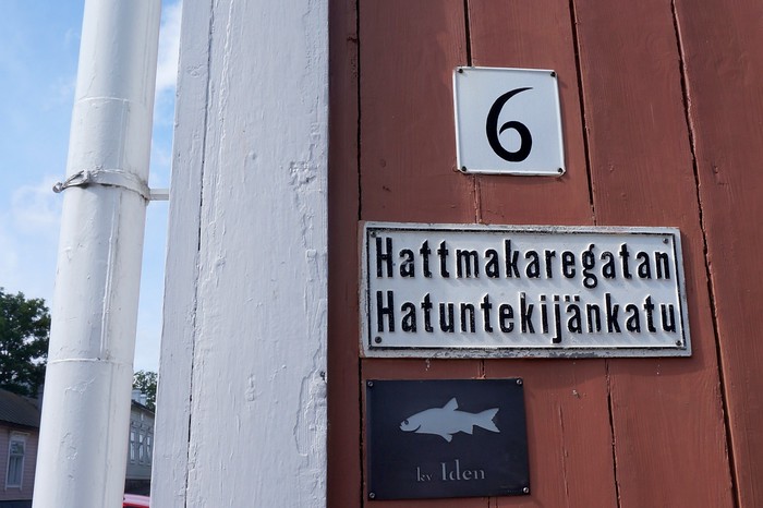 Street signs in the medieval town in Finland with fish icons