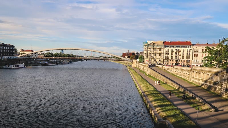Sunset on the Vistula River in Krakow where locals and tourists enjoying outdoors recreation and exercise Sunset on the Vistula River in Krakow where locals and tourists enjoying outdoors recreation and exercise