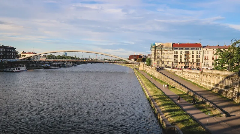 Sunset on the Vistula River in Krakow where locals and tourists enjoying outdoors recreation and exercise Sunset on the Vistula River in Krakow where locals and tourists enjoying outdoors recreation and exercise