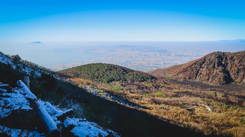Sweeping views from Mount Vesuvius in winter with snow from a high vantage point Sweeping views from Mount Vesuvius in winter with snow from a high vantage point