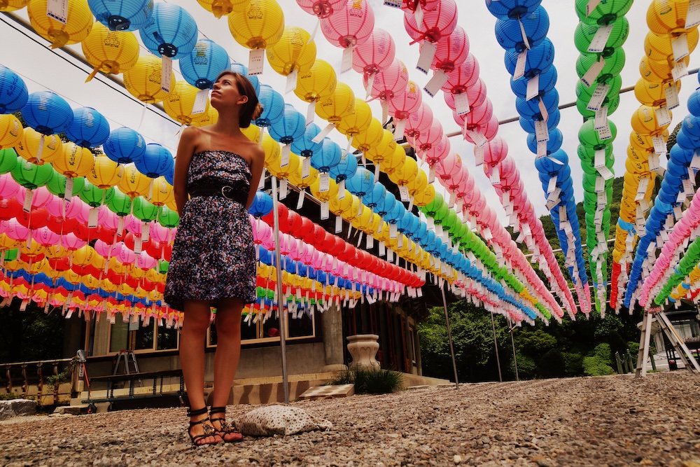 That Backpacker Audrey Bergner admiring colorful lanterns in Korea as an English teacher 
