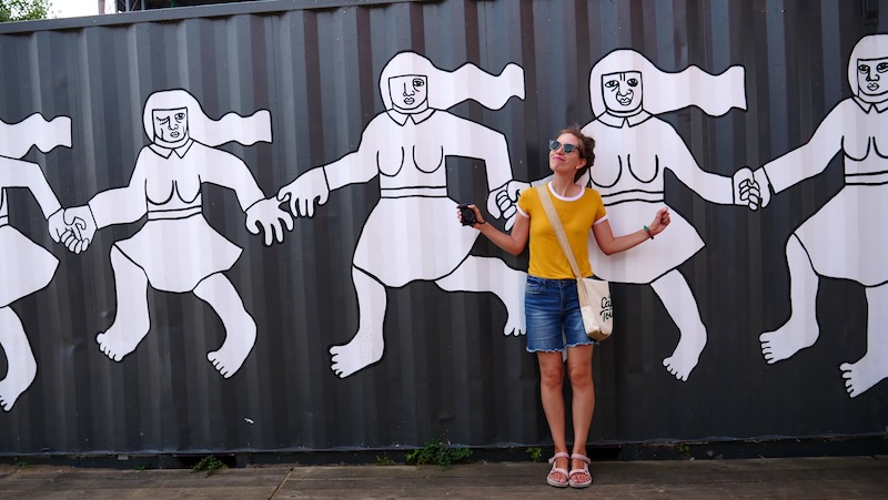 That Backpacker Audrey Bergner admiring container street art in Poznan, Poland 