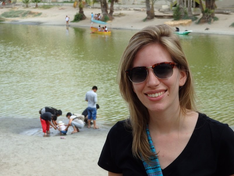 That Backpacker Audrey Bergner all smiles by the lagoon area of Huacachina, Peru 