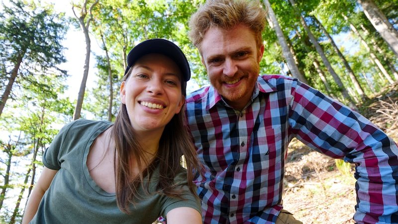 That Backpacker Audrey Bergner and Nomadic Samuel all smiles after taking a break hiking in Gaisberg, Austria 