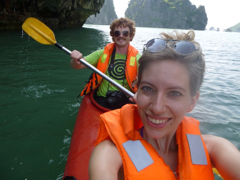 That Backpacker Audrey Bergner and Nomadic Samuel enjoying kayaking as an adventure sport in Halong Bay, Vietnam 
