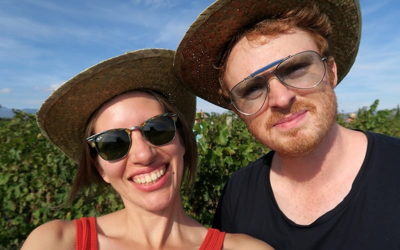 That Backpacker Audrey Bergner and Nomadic Samuel ready to harvest grapes in Costa Brava, Spain 