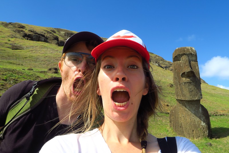 That Backpacker Audrey Bergner and Nomadic Samuel ridiculous selfie with a moai in the background whilst visiting Easter Island, Chile 
