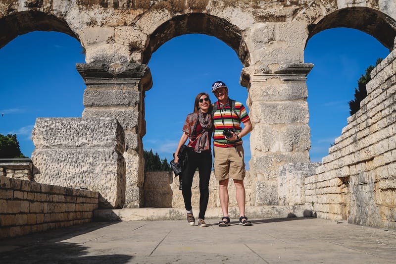 That Backpacker Audrey Bergner and Nomadic Samuel visiting Pula Arena in Istria, Croatia