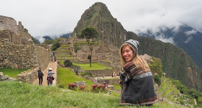 That Backpacker Audrey Bergner as happy as a clam visiting Machu Picchu, Peru 
