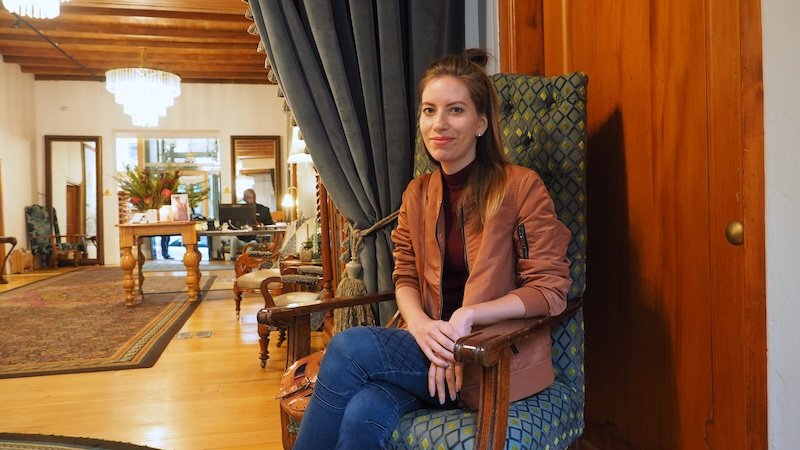 That Backpacker Audrey Bergner comfortable and cozy lounging at the hotel in Stellenbosch, South Africa 