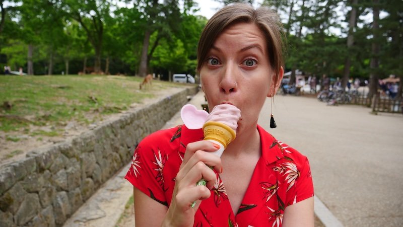 That Backpacker Audrey Bergner enjoying a bite of soft serve sakura ice cream in Nara, Japan That Backpacker Audrey Bergner enjoying a bite of soft serve sakura ice cream in Nara, Japan