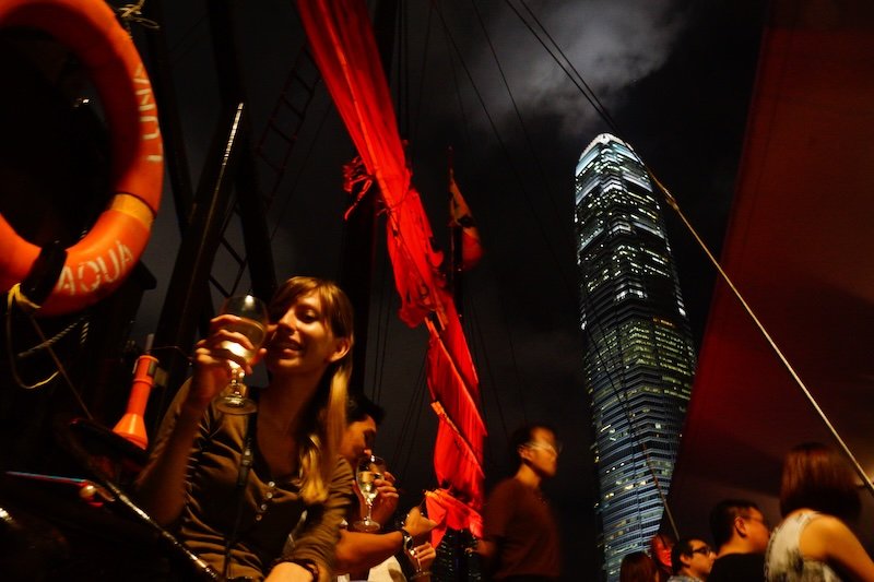 A Junk Boat Tour of Victoria Harbour Cruising Hong Kong At Night During A Symphony Of Lights!
