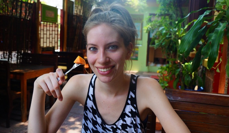 That Backpacker Audrey Bergner enjoying local fruit in Siem Reap, Cambodia on a SE Asia adventure of a lifetime journey!