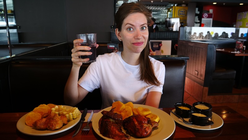 That Backpacker Audrey Bergner enjoying Pardos Chicken and Chicha Morada in Miraflores, Lima, Peru 