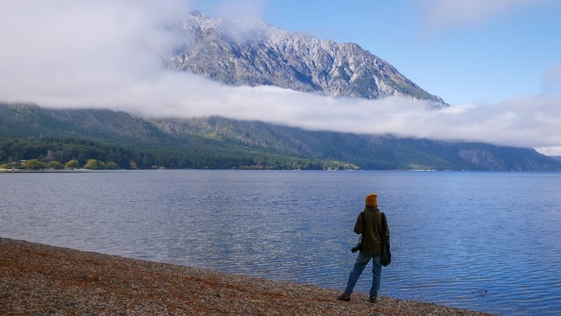 That Backpacker Audrey Bergner enjoying stunning lake and mountain views in El Hoyo, Patagonia, Argentina 