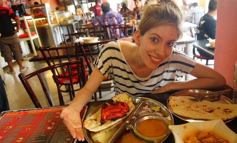 That Backpacker Audrey Bergner enjoying Tandoori chicken, naan bread and curry for lunch in George Town, Penang, Malaysia That Backpacker Audrey Bergner enjoying Tandoori chicken, naan bread and curry for lunch in George Town, Penang, Malaysia