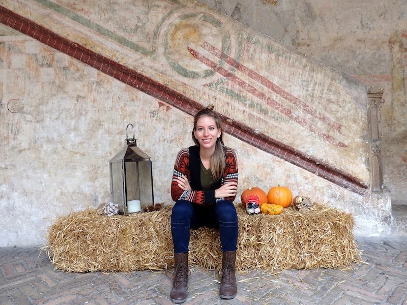 That Backpacker Audrey Bergner enjoying visiting Bergamo sitting beside a pumpkin in Lombardy, Italy That Backpacker Audrey Bergner enjoying visiting Bergamo sitting beside a pumpkin in Lombardy, Italy