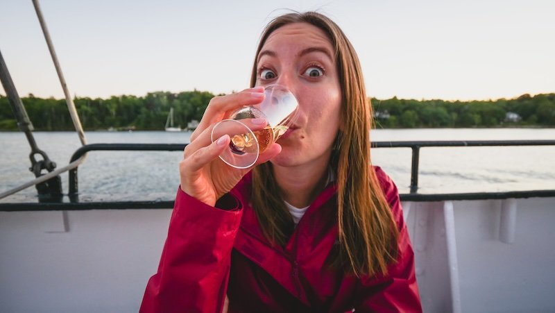 That Backpacker Audrey Bergner enjoying wine whilst sailing in Halifax, Nova Scotia 