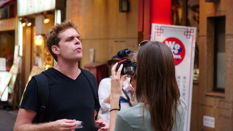 That Backpacker Audrey Bergner filming with our friend Rob from Stop Having A Boring Life in Tokyo, Japan 