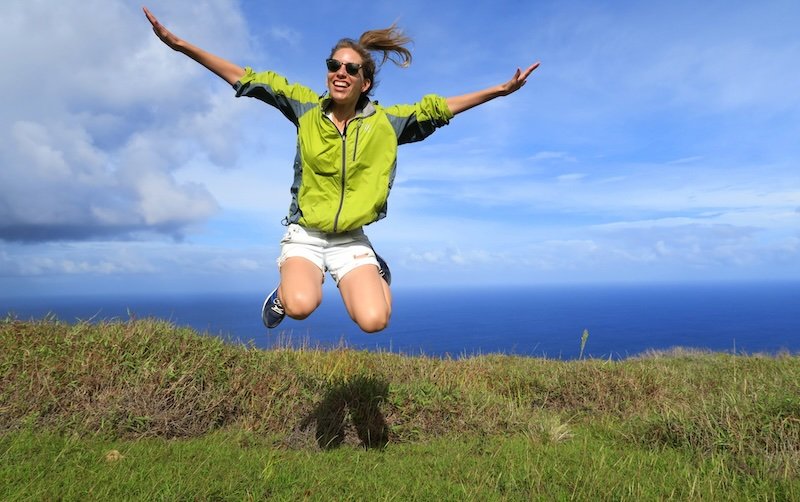 That Backpacker Audrey Bergner jumping for joy visiting Easter Island Rapa Nui, Chile backpacking South America 