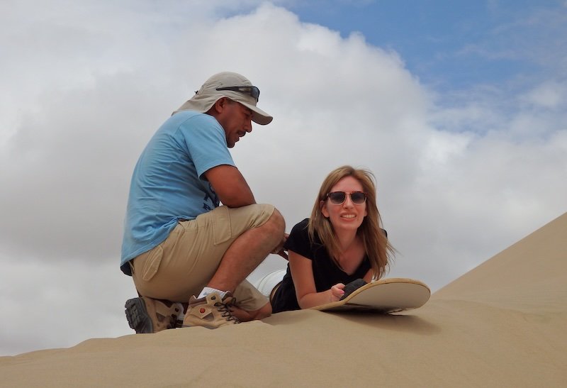 That Backpacker Audrey Bergner looking nervous before going face first sandboarding in Huacachina, Peru 