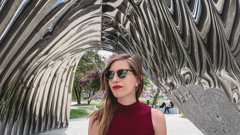That Backpacker Audrey Bergner looking stylish next to the steel arches in Wroclaw, Poland That Backpacker Audrey Bergner looking stylish next to the steel arches in Wroclaw, Poland