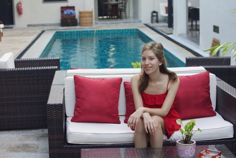That Backpacker Audrey Bergner lounging by the pool at Noordin Mews in Penang, Malaysia staying at a boutique hotel That Backpacker Audrey Bergner lounging by the pool at Noordin Mews in Penang, Malaysia staying at a boutique hotel