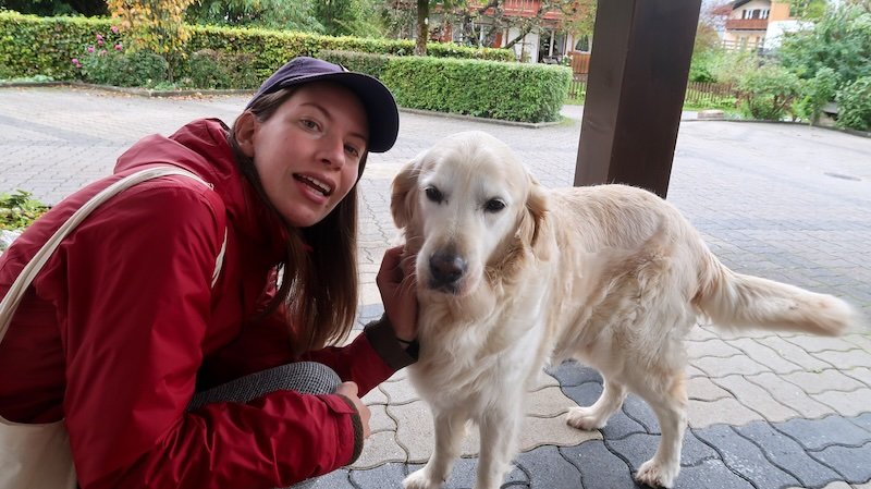 That Backpacker Audrey Bergner making new friends with local dogs whilst traveling in Germany 