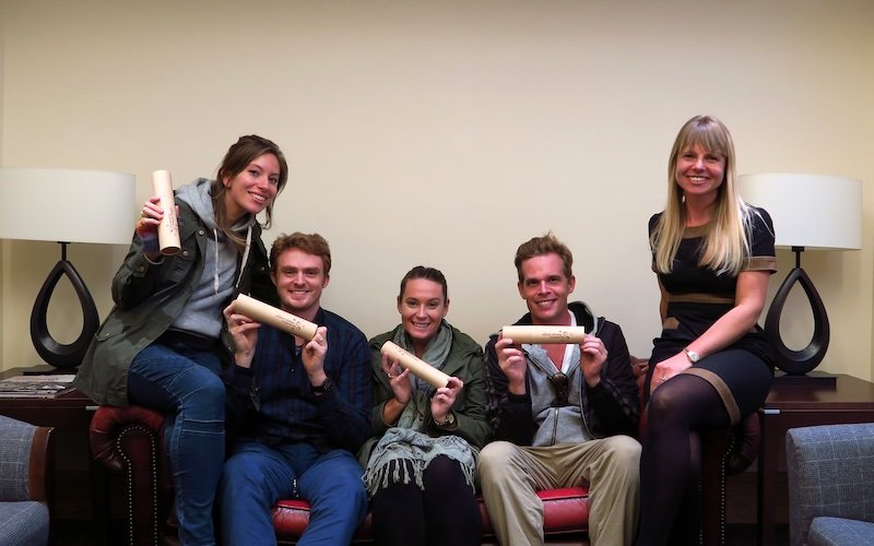Group photo with That Backpacker Audrey Bergner and Nomadic Samuel at the Scotch Whisky Experience in Edinburgh, Scotland holding personalized whisky blends Group photo with That Backpacker Audrey Bergner and Nomadic Samuel at the Scotch Whisky Experience in Edinburgh, Scotland holding personalized whisky blends