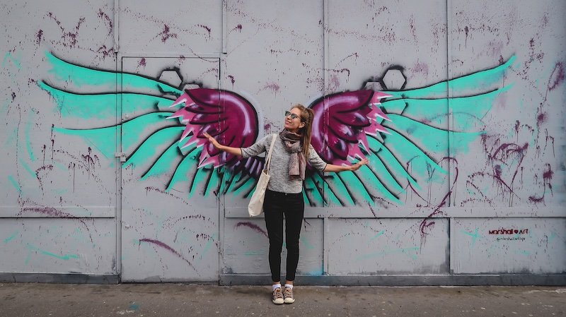 That Backpacker Audrey Bergner posing by graffiti street art in London on a fine autumn afternoon in Europe That Backpacker Audrey Bergner posing by graffiti street art in London on a fine autumn afternoon in Europe