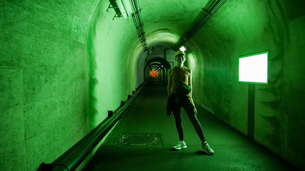 That Backpacker Audrey Bergner posing inside the green tunnel light at Kiyotsu Gorge, Japan That Backpacker Audrey Bergner posing inside the green tunnel light at Kiyotsu Gorge, Japan