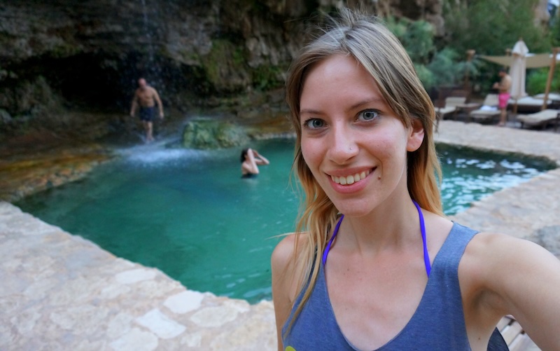 That Backpacker Audrey Bergner ready to relax in a cave pool after visiting Petra, Jordan 