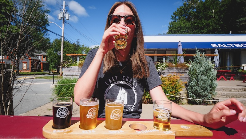 That Backpacker Audrey Bergner slowing down by enjoying a flight of beer from Saltbox visiting Mahone Bay, Nova Scotia That Backpacker Audrey Bergner slowing down by enjoying a flight of beer from Saltbox visiting Mahone Bay, Nova Scotia