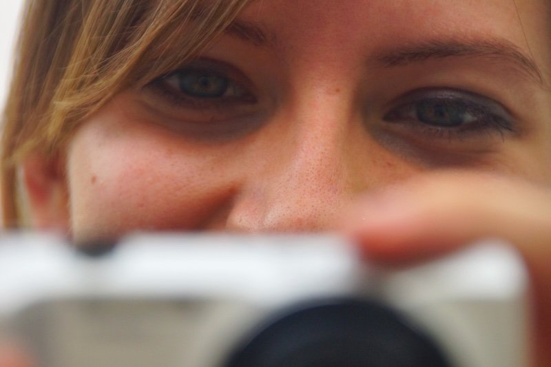 That Backpacker Audrey Bergner capturing photos in South Korea, close-up portrait showing joy behind the camera That Backpacker Audrey Bergner capturing photos in South Korea, close-up portrait showing joy behind the camera