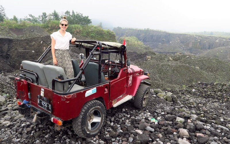 That Backpacker Audrey Bergner standing tall and posing on the Merapi Jeep Loop in Indonesia 