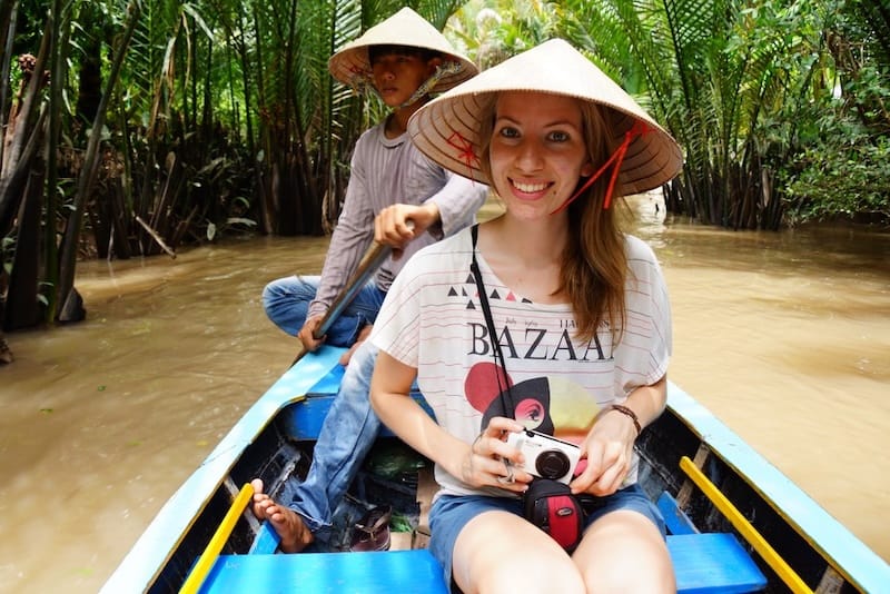 That Backpacker Audrey Bergner taking photos on the Mekong Delta tour in Vietnam 
