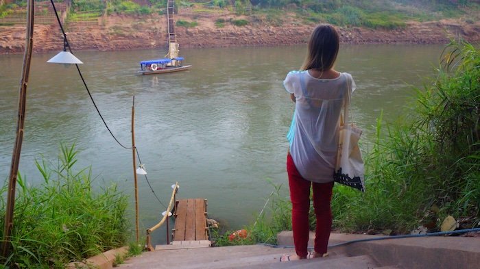That Backpacker Audrey Bergner taking riverside photos in Luang Prabang, Laos 
