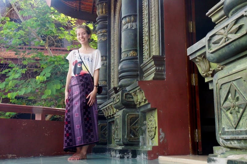 That Backpacker Audrey Bergner wearing a local skirt visiting the Mekong Delta in Vietnam 