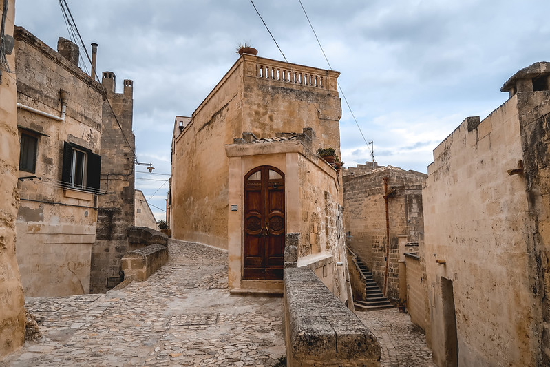 The ancient streets of Matera with alleyways and staircases and quirky entrances and doorways in Italy The ancient streets of Matera with alleyways and staircases and quirky entrances and doorways in Italy