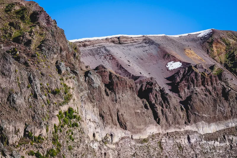 The caldera of Mount Vesuvius with jagged rocky formations in Italy The caldera of Mount Vesuvius with jagged rocky formations in Italy