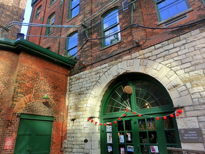 The Distillery District at Christmas time with its charming brick facade is a jolly place to host the market in Toronto