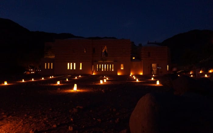 The Feynan Eco-Lodge lit by candlelight at night which is a most impressive sight to behold 