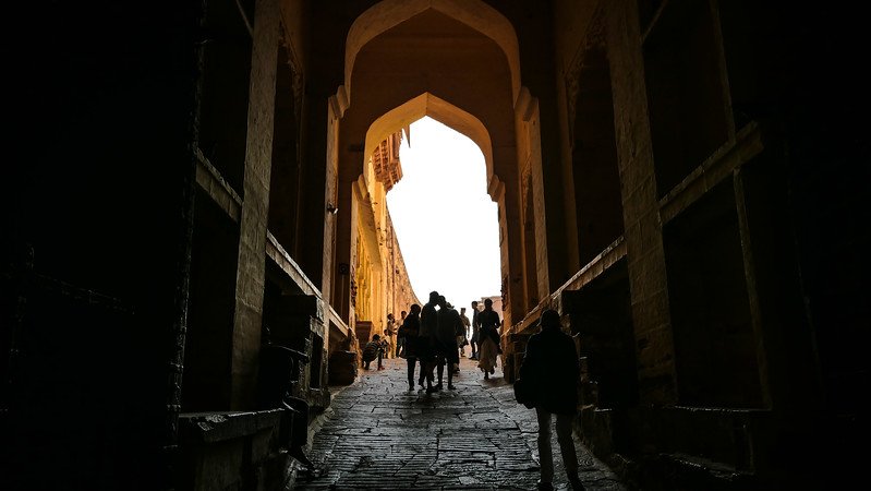 The gates leading into Mehrangarh Fort are narrow but deep with light forming like a tunnel in Jodhpur 