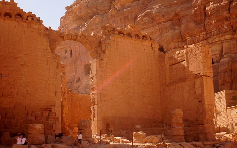 The great archway and other ruins in Petra, Jordan stand tall as distinct and fascinating landmarks  